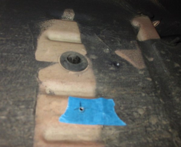 drilled holes in underside of van steel floor