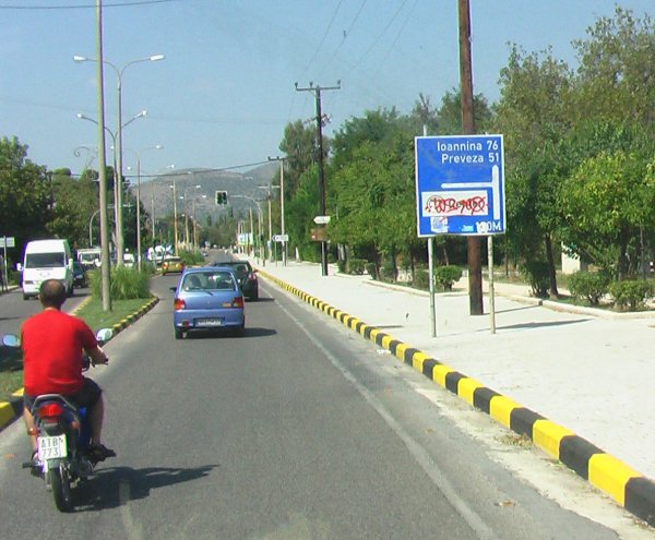 graffiti on signs in Greece