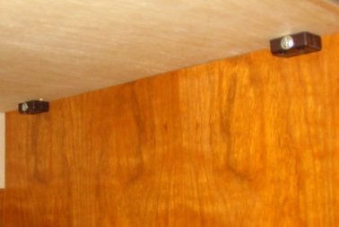 Plastic fixing blocks under worktop